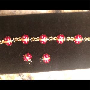 Joan Rivers gold ladybug bracelet and earrings set
